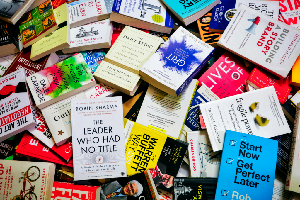 pile of books reresenting must-read marketing books